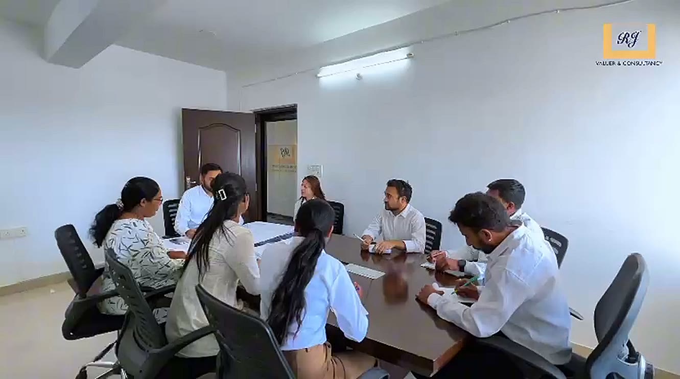 Team meeting in the RJ Valuer conference room