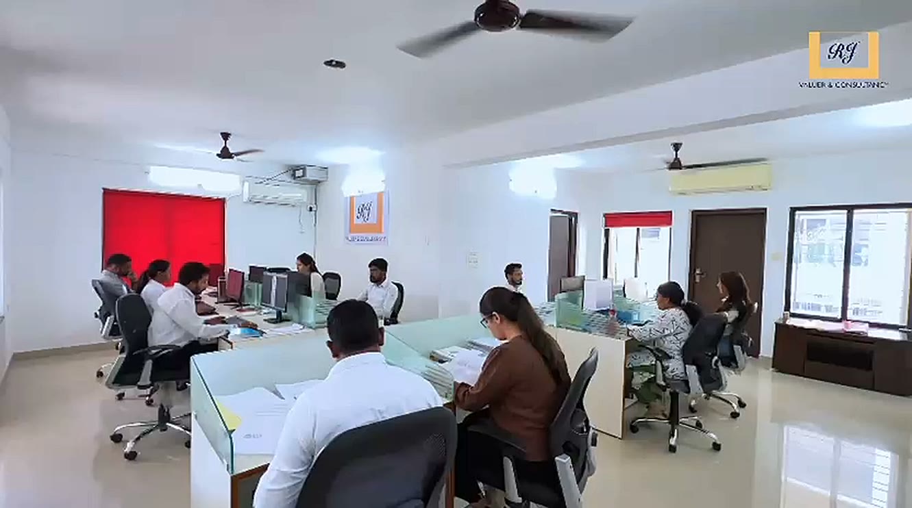 RJ Valuer team at work in the open-plan office, Nagpur
